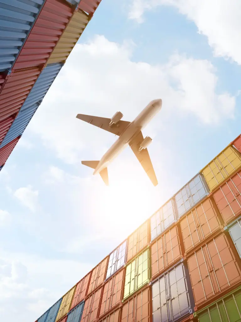 air-freight-cargo-plane-flying-stack-containers-container-port_converted